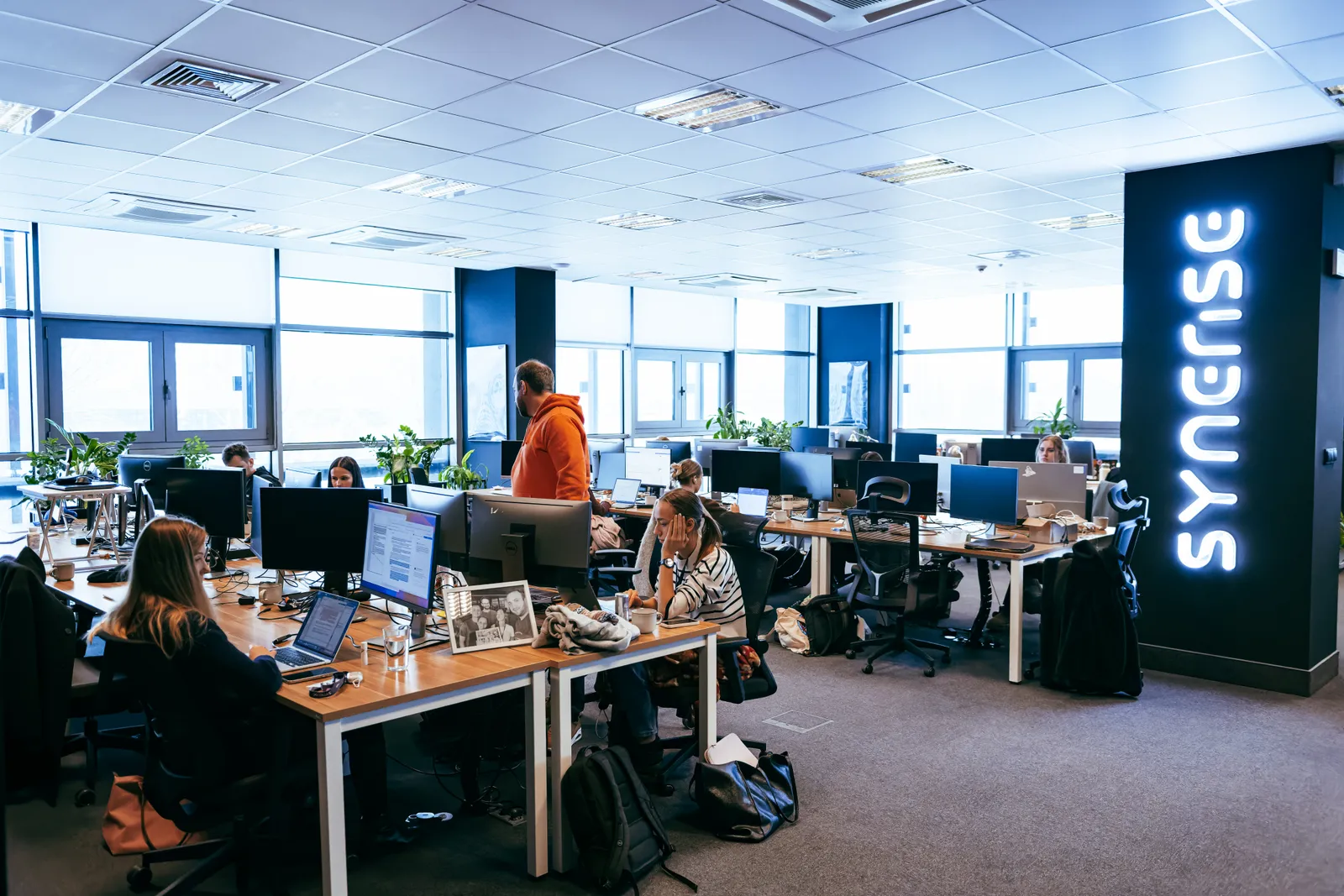 Kraków HQ — workspace with the Synerise logo